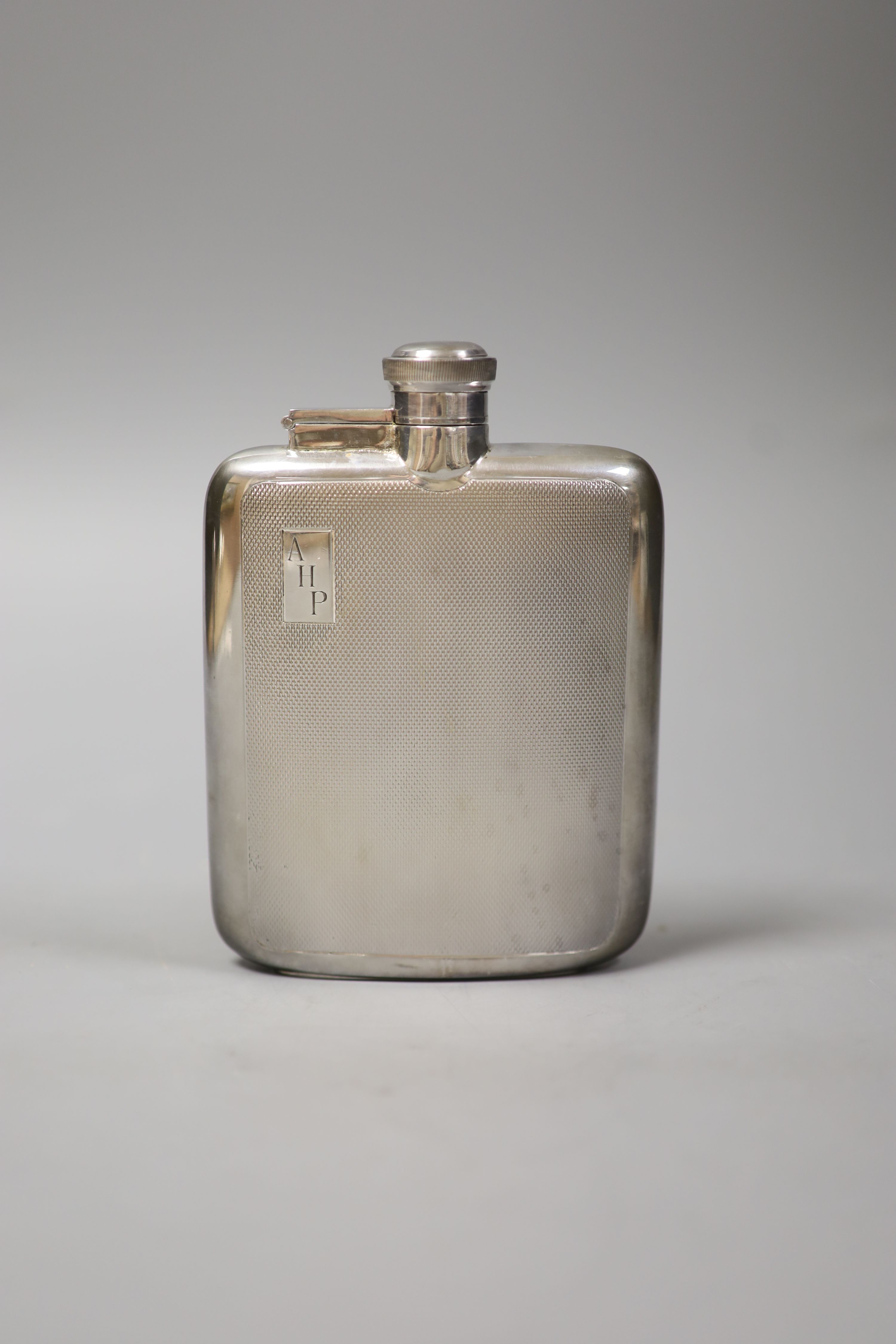 A James Dixon & Sons engine-turned silver hip flask, Sheffield, 1964,